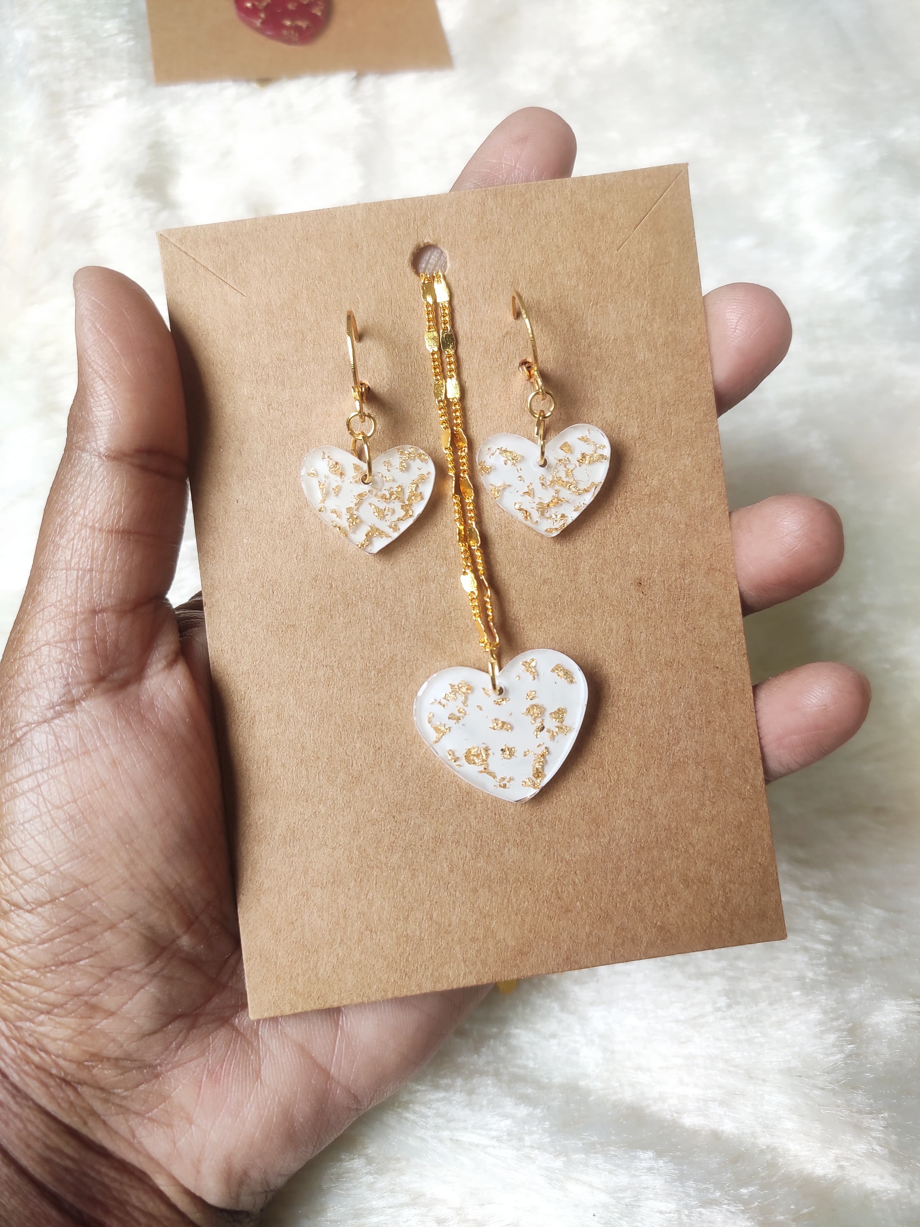 White heart necklace.