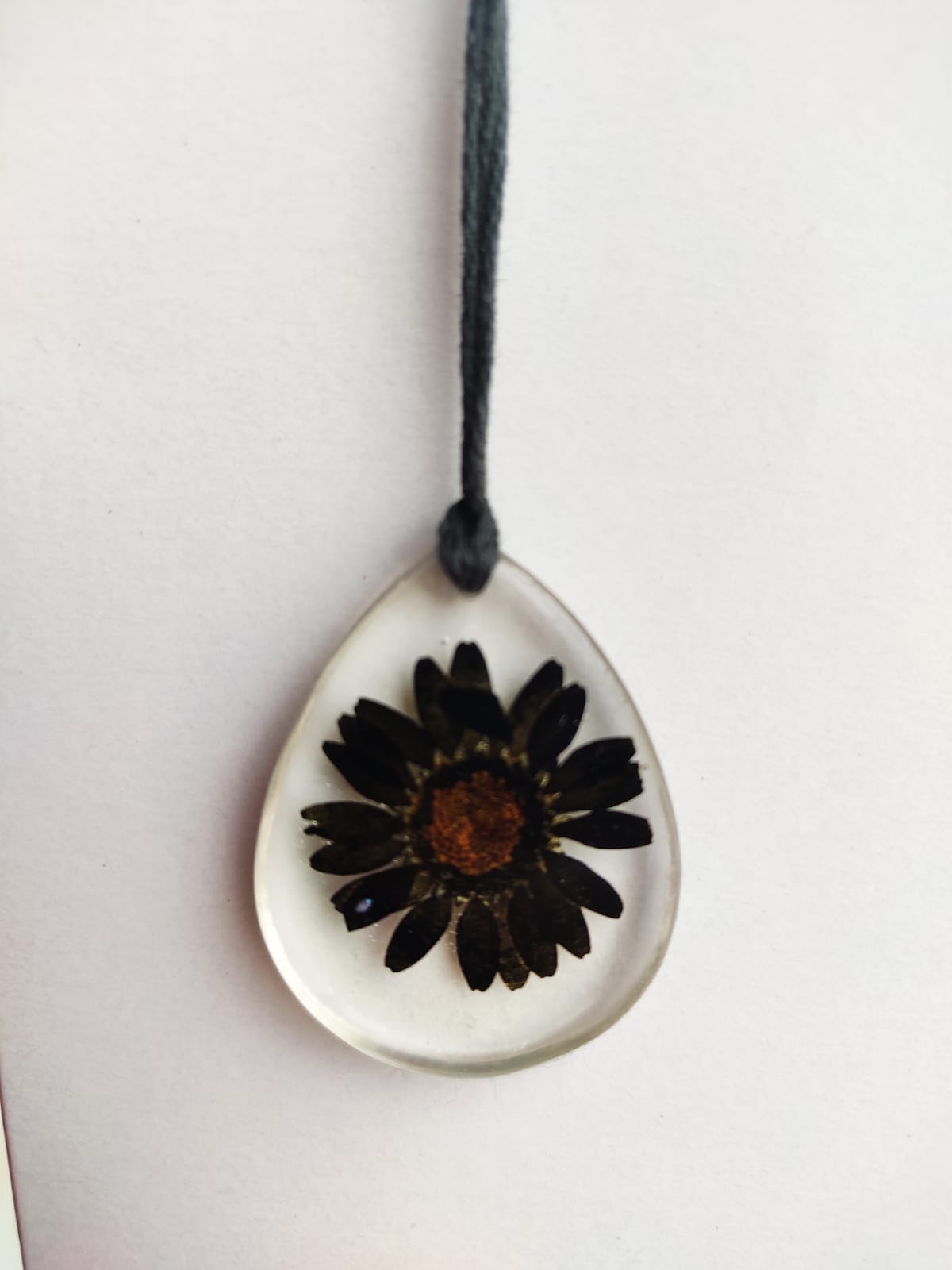 Black Daisy floral pendant